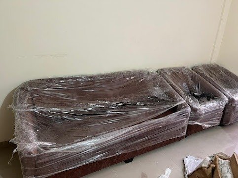 Wrapped sofa set ready for delivery